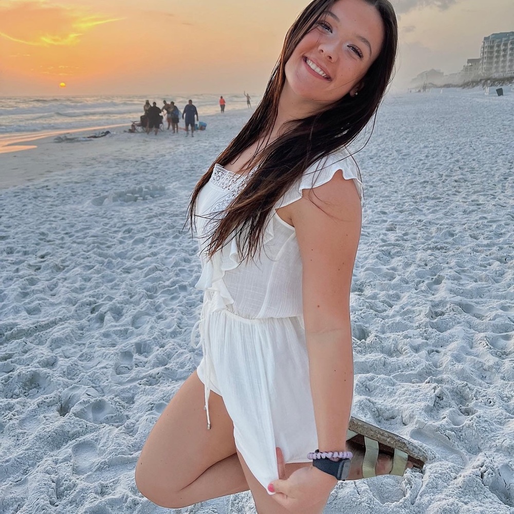 white romper from vestique boutique. Size small